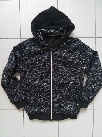 Veste réversible à capuche. 12ans