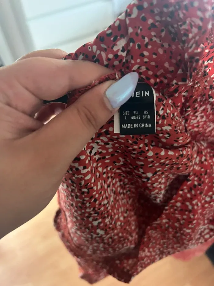 Blouse épaules ajourées taille L neuve - photo numéro 3