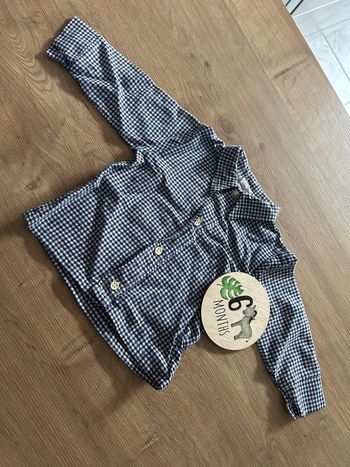 Chemise à carreaux blanche et bleu