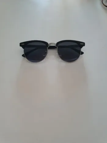 Paire de lunettes et soleil H&M
