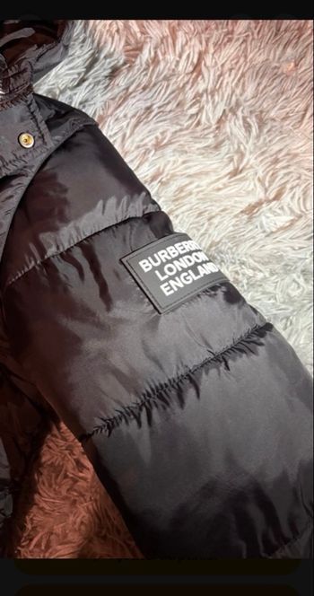 Veste matelassée Burberry noire avec facture