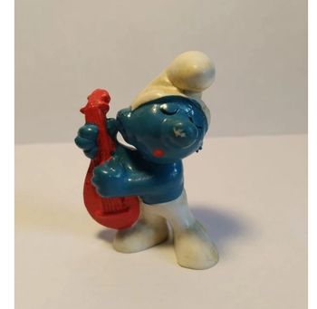 Schtroumpfs Peyo 1969 
Guitariste