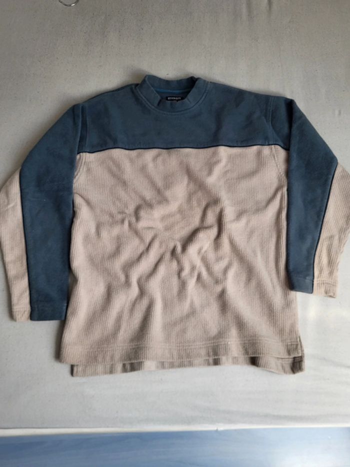 Très beau pull de taille L.