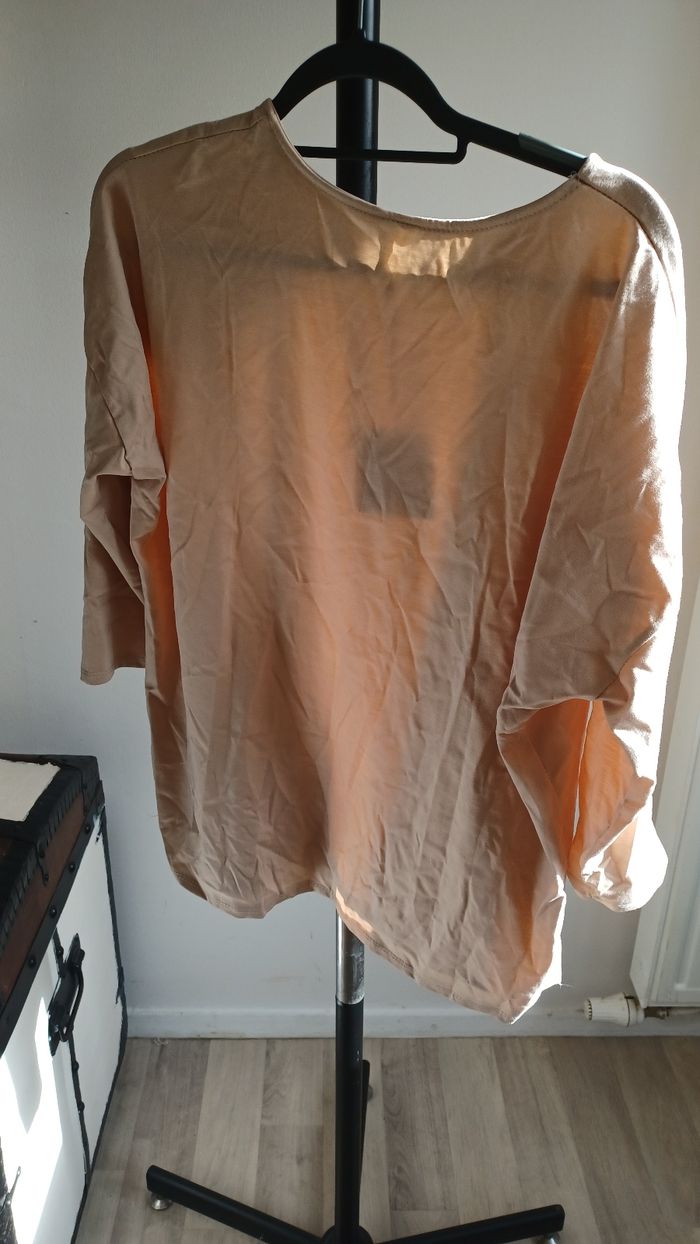 Pull matière satiné