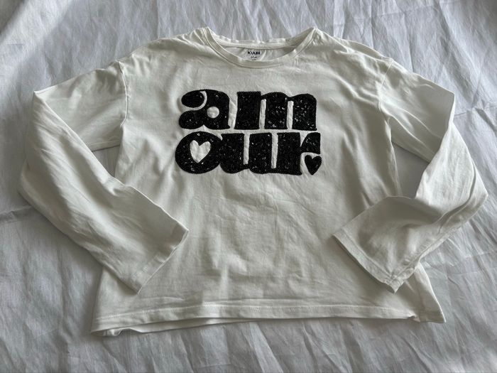 Haut blanc amour sequin noir