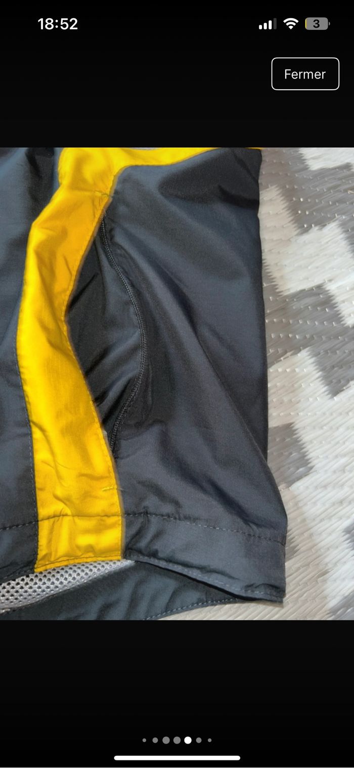 Veste ASICS qui peut se porter en doudoune sans manches - photo numéro 5