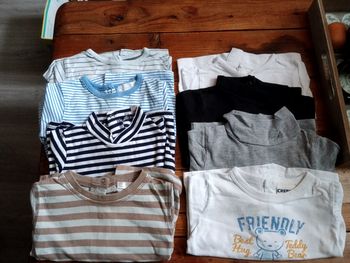 8 Tee-shirt avec pressions arrière