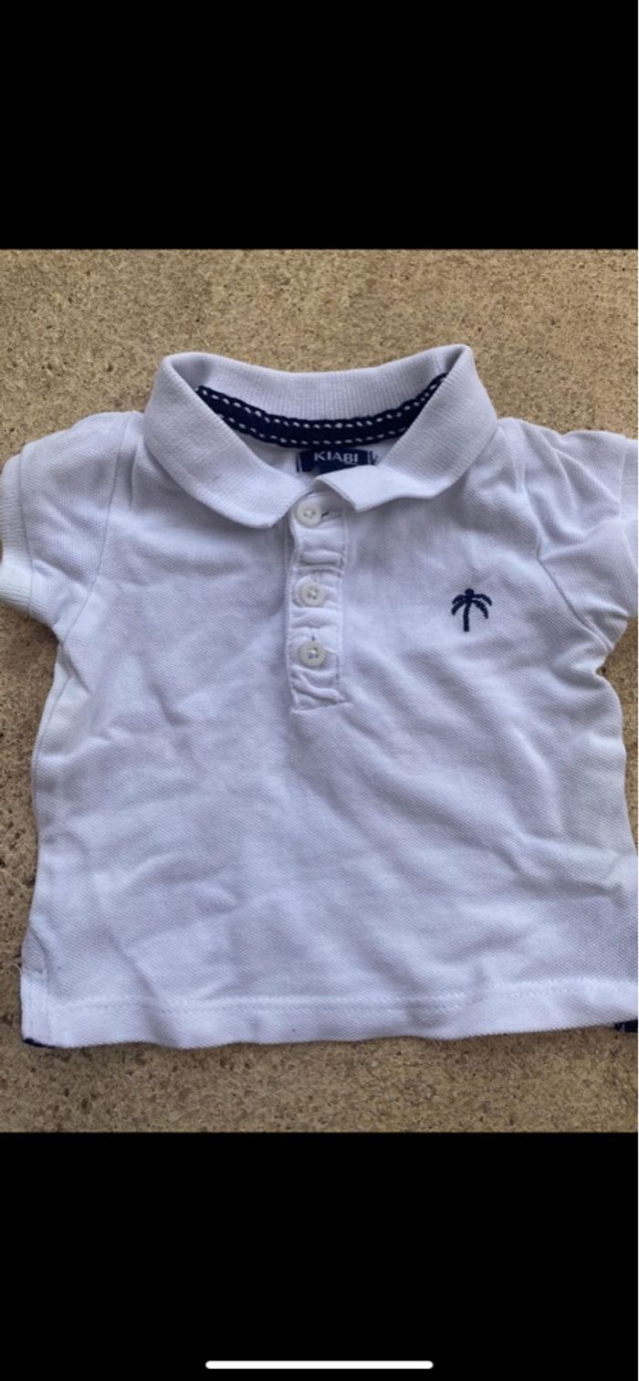 Polo kiabi bleu marine et blanc
