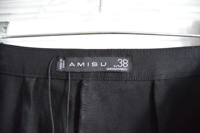 Pantalon noir AMISU coupe évasée bas volanté - photo numéro 3