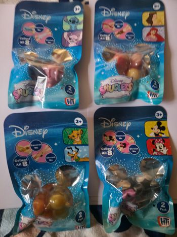 Lot de 4 packets de disney snuglets à collectionner