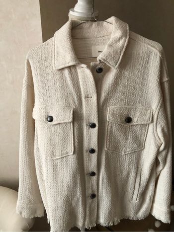 Très belle veste écrue excellent état