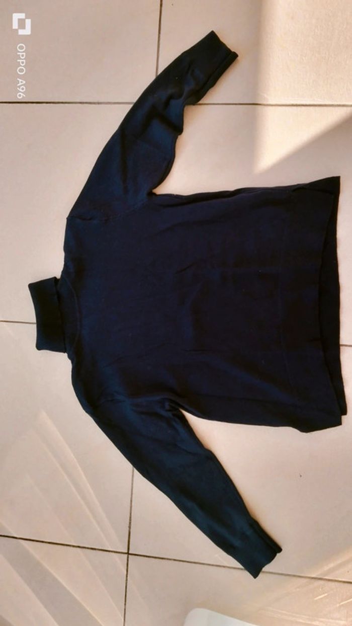 Pull col roulé