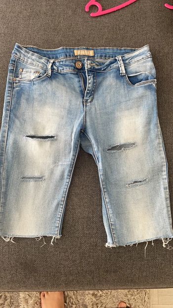 Short long en jean troué