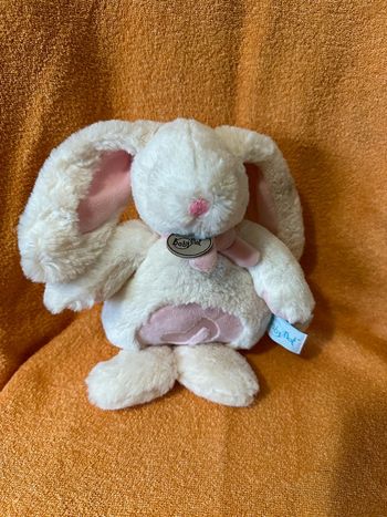 Peluche musical lapin blanc et rose, marque Baby Nat