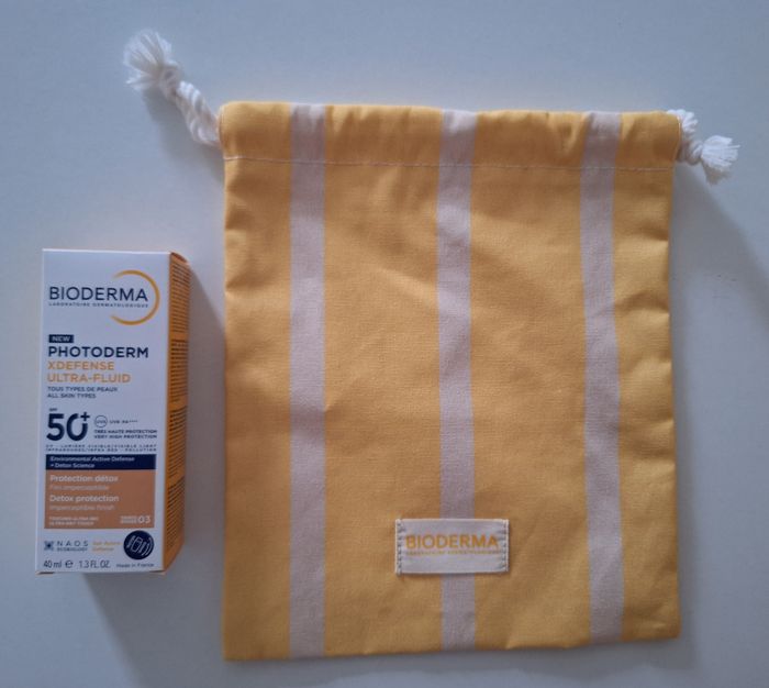 Crème solaire indice 50+ et sa pochette en tissu