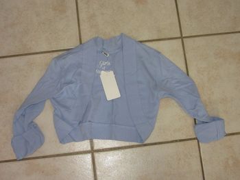 boléro en coton neuf taille 8/10 ans