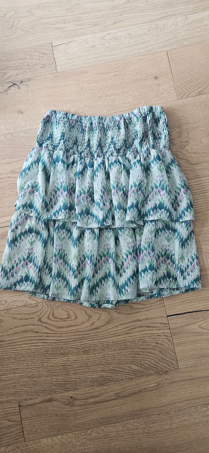Jupe mi courte