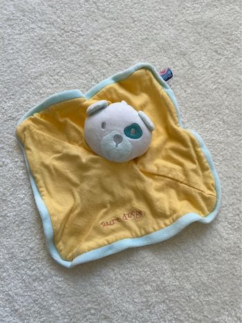 Doudou plat jaune ours sucre d’orge