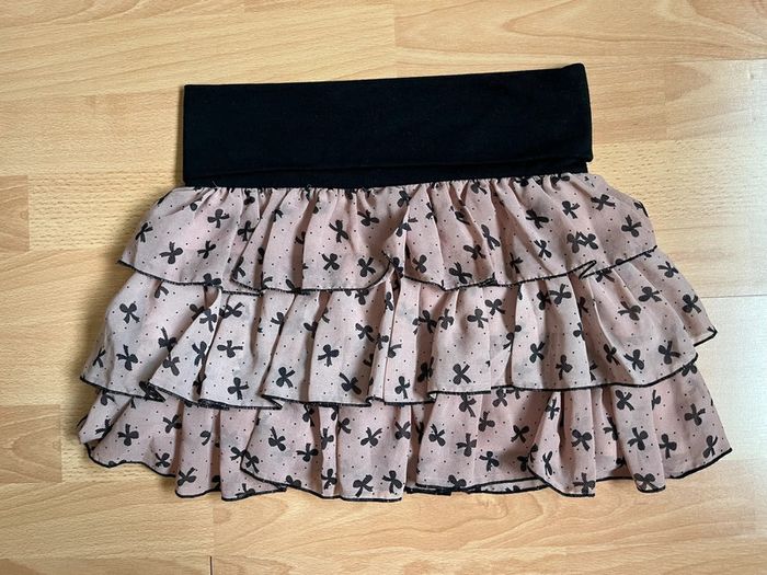 Jupe motif noeud rose pale