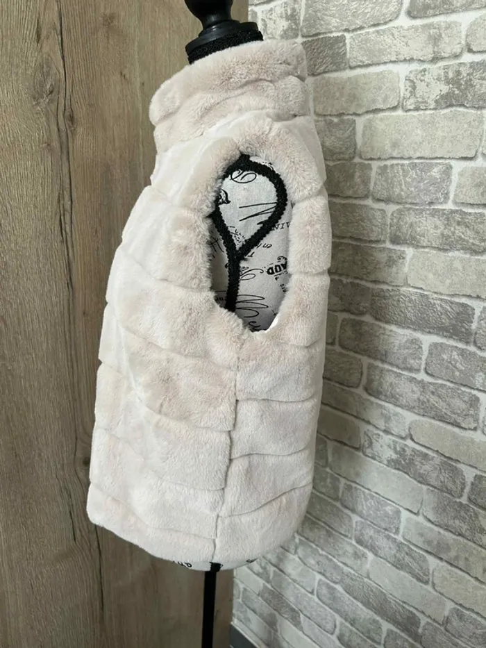 Doudoune sans manches taille L/XL - photo numéro 4