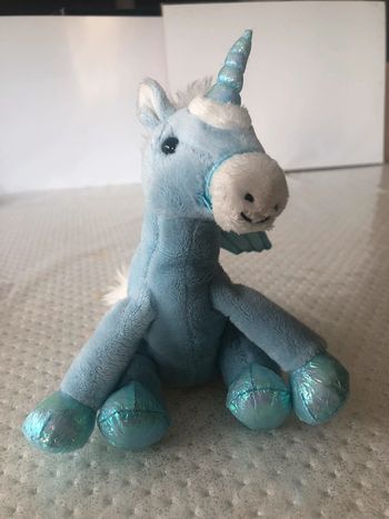 Peluche licorne bleu