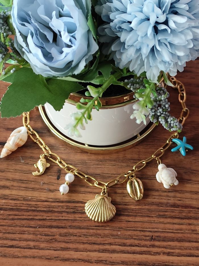 Collier coquillage étoile bleu ✅