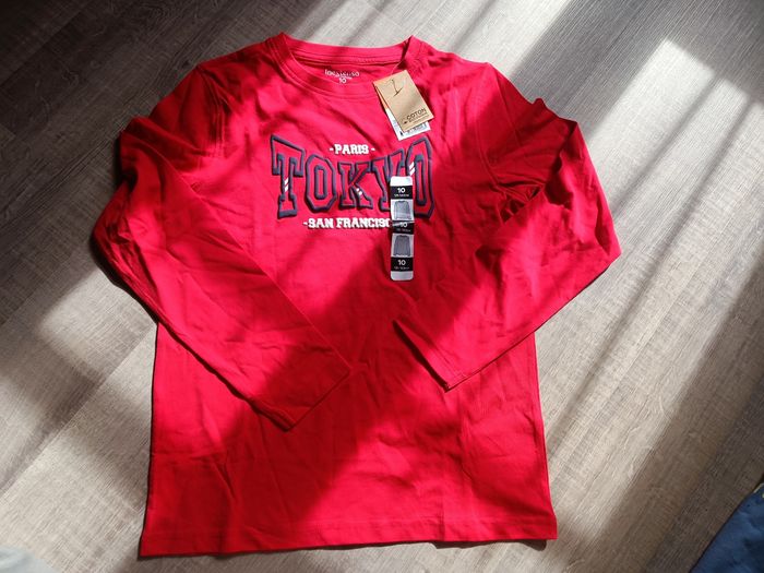 Neuf haut enfant 10 ans