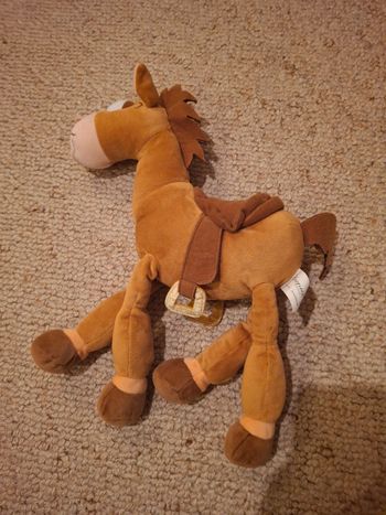 Peluche cheval pil poil de toy story de disneyland paris