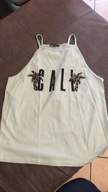 Débardeur bleu turquoise 14/16 ans