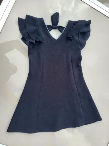 Robe noire pailletée 8 ans