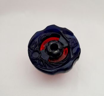 Toupie Beyblade rouge et bleue