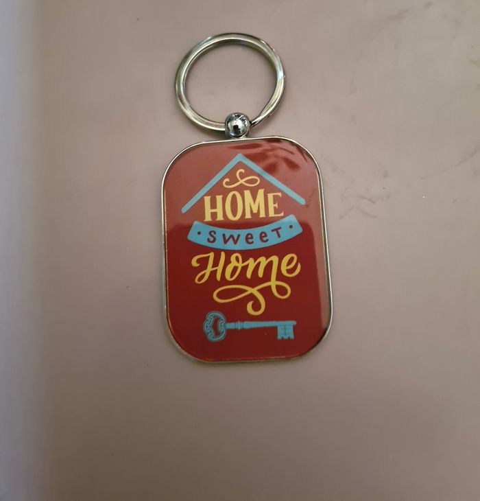 Porte clés.  Neuf. 9 x 4 cm . Home sweet home.