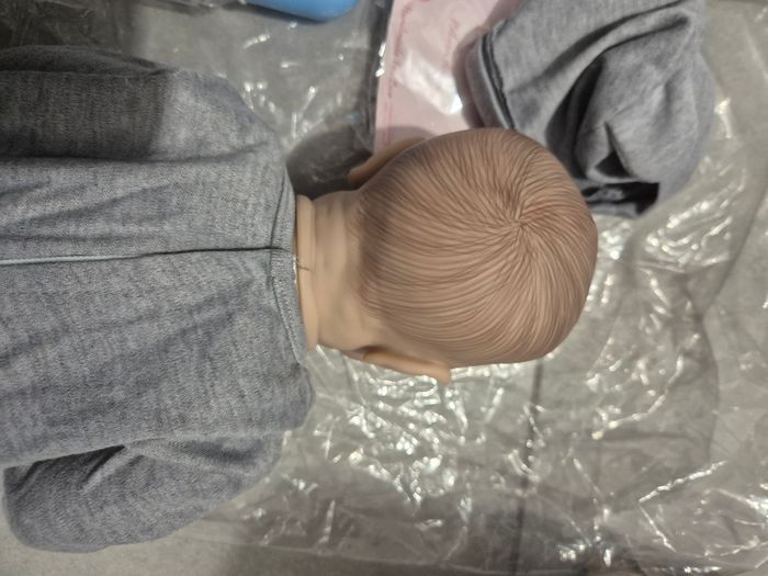 Poupée de garçon bébé réaliste Reborn Neuf - photo numéro 8
