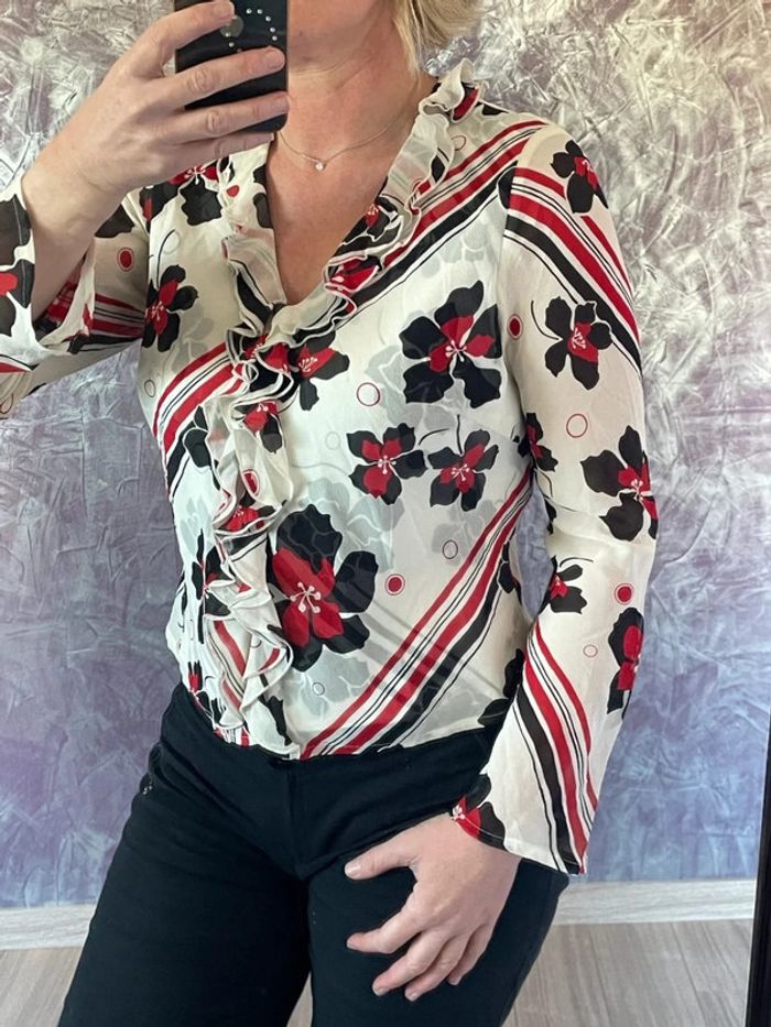 Superbe blouse à volants en soie
