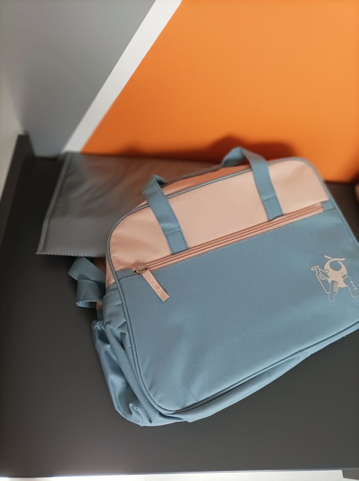 sac a langer + tapis de change