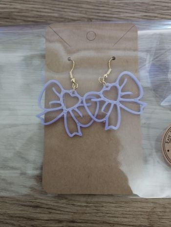 Boucle d'oreille noeud coeur