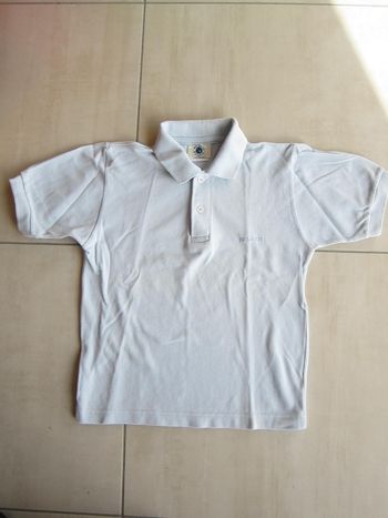 Polo ciel 10 ans neuf
