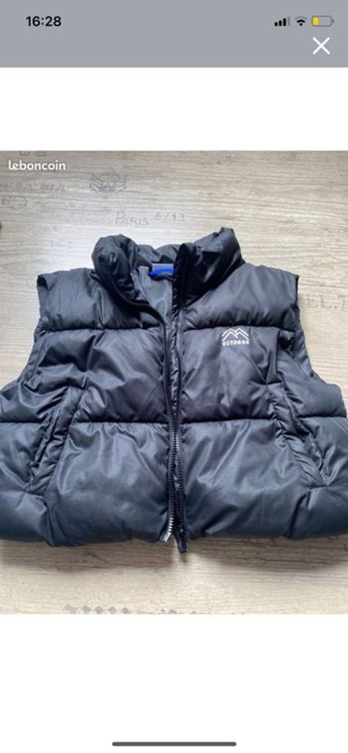 Veste noir simple sans manche