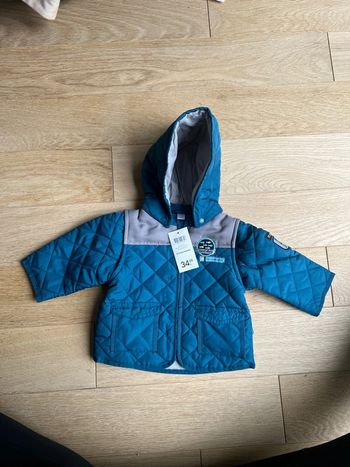 Manteau neuf avec étiquette obaibi bleu canard 6 mois