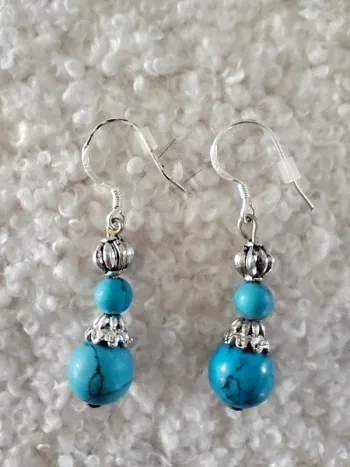 Boucles d'oreilles en plaqué argent boules bleu