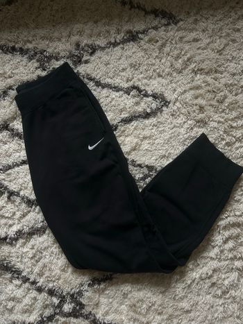 Jogging Nike noir bon état large taille M