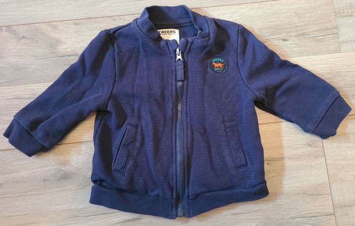 Gilet creeks 6mois TBE