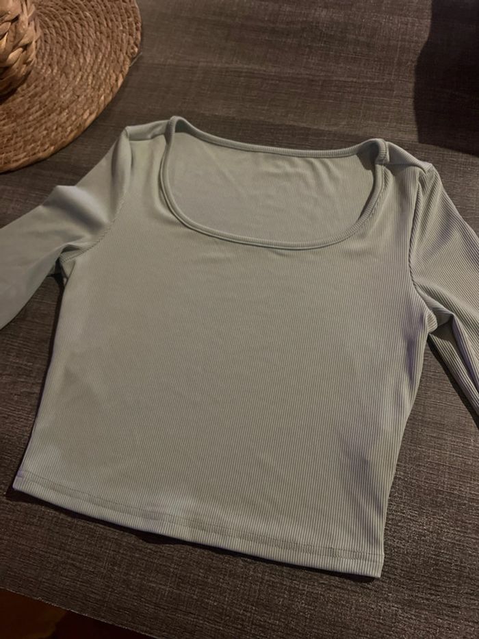 T-shirt manches longues neuf jamais porté, taille 36