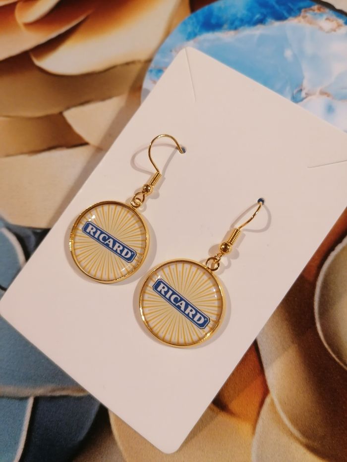 Boucle d'oreille ricard
