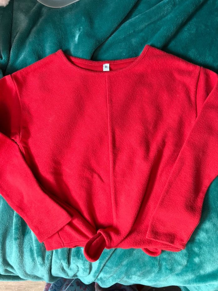 Pull rouge 8 ans