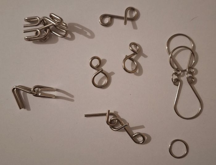 Lot de deux casse-tête chinois