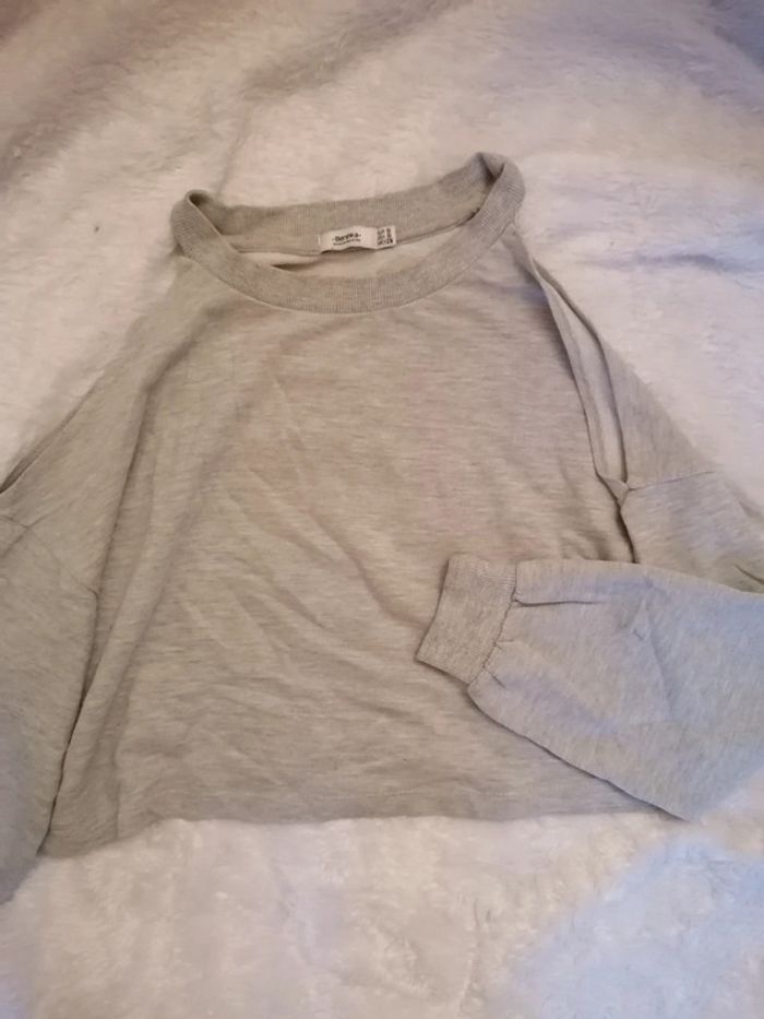 Pull épaule dénudé