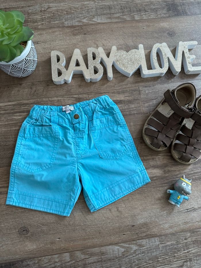 - Short In extenso - 12 mois - Très bon état