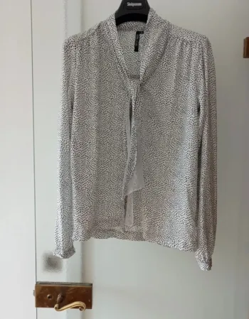 Blouse blanche à pois manche longue