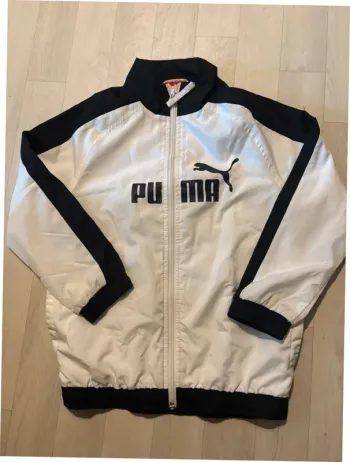 Veste de jogging puma blanche et noire 6 ans très bon état
